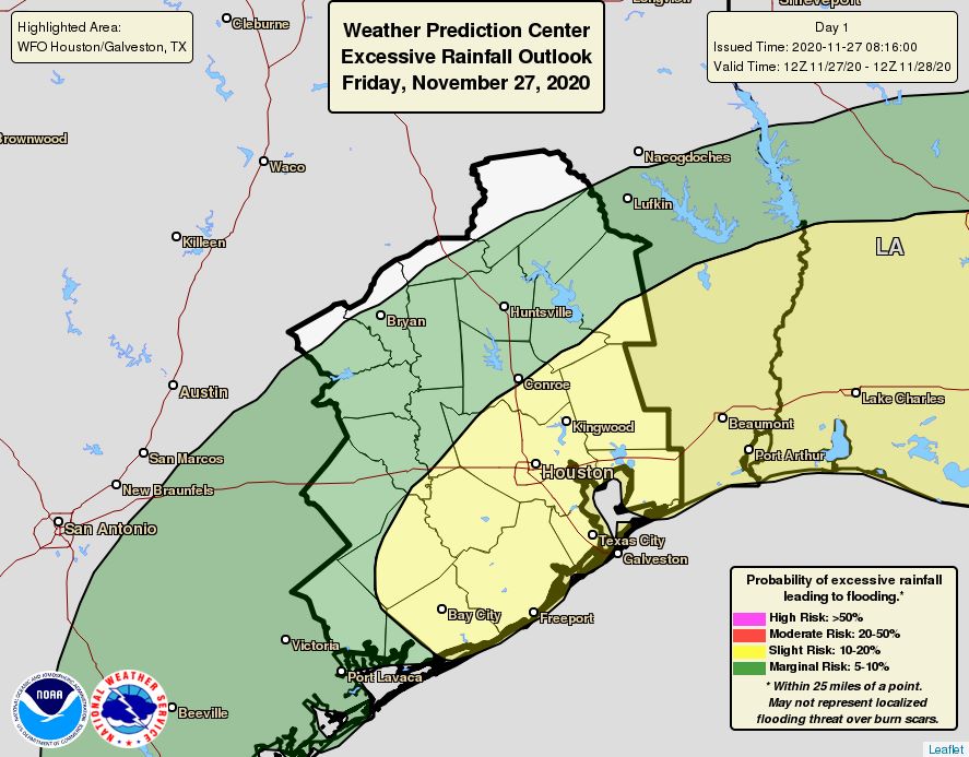 Graphic of the Houston region with a green band representing "Marginal Risk" over areas to our north, and a yellow band over Houston and the coast representing Slight Risk. 